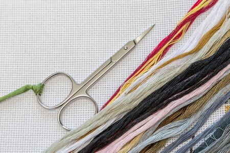 Threads for cross stitching on the tableの写真素材