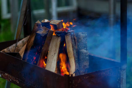 Burning charcoal in the fire for barbecueの写真素材