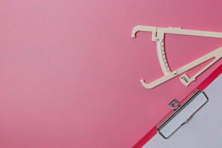 Close up of a tame measurement and body fat caliper.の写真素材