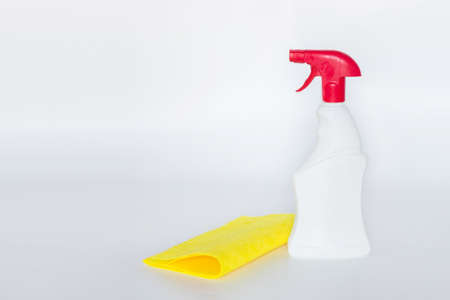 Plastic bottles with chemicals for home cleaning on a white background.の写真素材