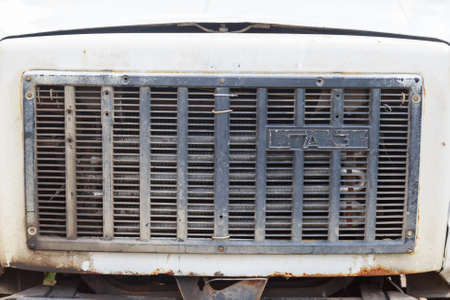 Rusty font grill of an old russian GAZ truck
