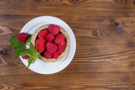 Raspberry. Health, summer. still life on wooden background.