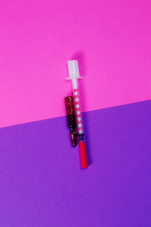 Injectable medications in sealed vials and a disposable plastic medical syringe