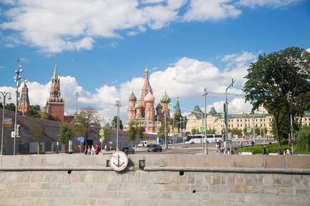 MOSCOW, RUSSIA - AUGUST 21, 2020: Spasskaya Tower and Cathedral of Vasily the Blessed Saint Basil's...