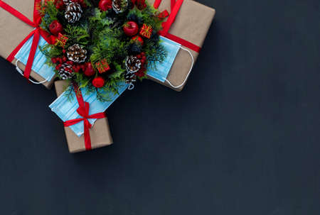 .New year in the context of coronavirus presents with medical masks on a chalk boardの写真素材