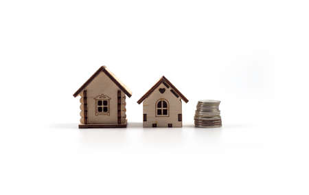 .Real Estate Sale Small Toy Wooden Houses on white background.の写真素材