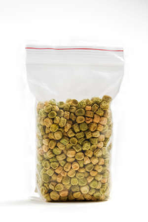 Dry pea seeds for germination isolated on a white background.