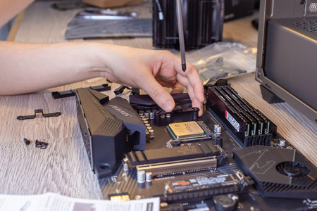 Installing a processor fan on the computer motherboard, PC assemblyのeditorial素材