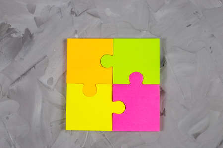 .Close-up of colored sticky paper stickers on concrete backgroundの写真素材