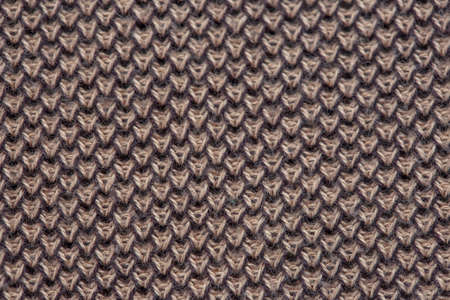 Close-up texture of a knitted fabric of a factory made
