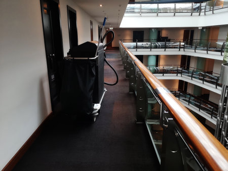 MOSCOW, RUSSIA - FEBRUARY 14, 2021: Hall of a luxury hotel in Moscow, a maid trolley stands next to the room, room cleaningのeditorial素材