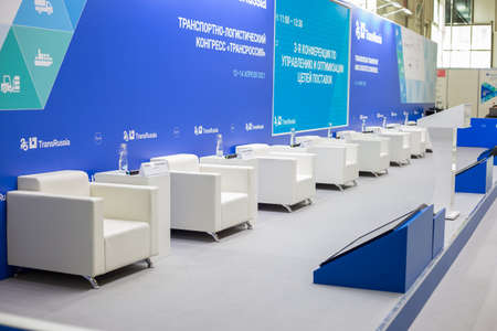 Moscow, Russia - 14 april 2021: Hall for presentations and lectures on International exhibition of transport and logistics services, empty chairs seats in hallのeditorial素材