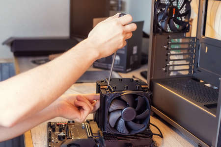 Installing a cooler on a personal computer processor. The process of upgrading computer maintenance...