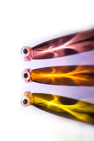 Perfume bottles studio shot on white with reflection. Perfumes, cosmetics, a collection of...
