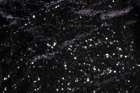 Black round sequins beautiful material and circleの写真素材