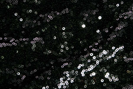 Black round sequins beautiful material and circleの写真素材