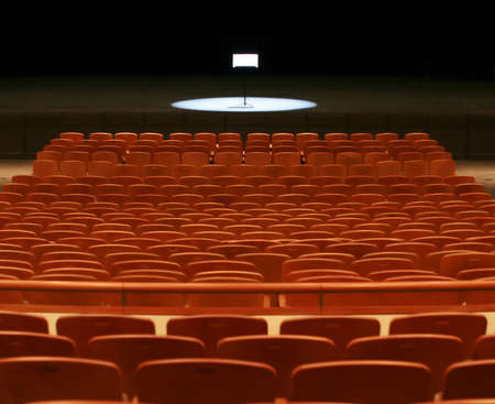 Empty concert hall with spot light on conductor standの写真素材