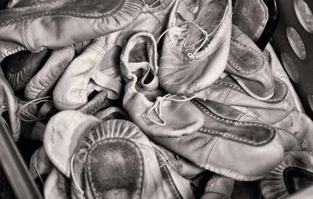Classical ballet school: box with worn ballet shoesの写真素材