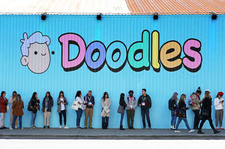 AUSTIN, TEXAS - MARCH 12, 2022: SXSW South by Southwest  festival. Colorful sign "Doodles" on the wall with crowd of SXSW festival members, 6th street, Austinのeditorial素材
