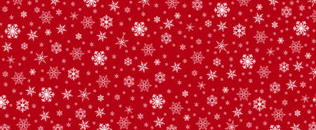 dark red christmas background with snowflakes with space for text or imageの写真素材
