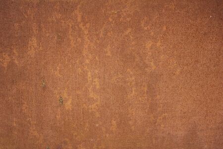 a wall made of rusty sheet iron
