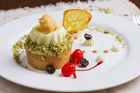 Dessert with cherries, susani orange and grapesの写真素材