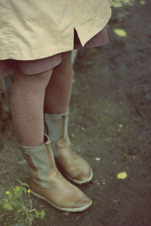 Female legs in boots, brown tights. Autumn moodの写真素材
