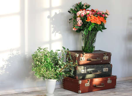 Different flowers in vases for floral workshop in the art studio. Florist's working placeの写真素材