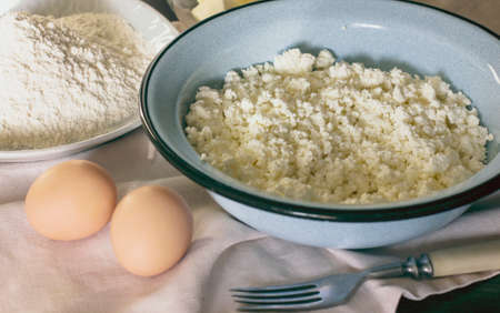 Eggs, cheese and flour for cooking の写真素材