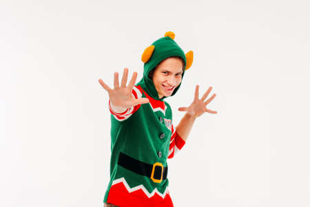 Attractive young men in elf costume on white backgroundの写真素材