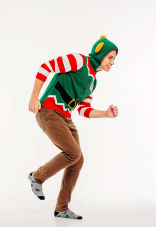 Attractive young men teenager in elf costume on white backgroundの写真素材