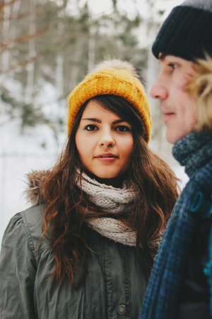 The happy couple in love of young man and woman at the forest nature park. Travel adventure love...