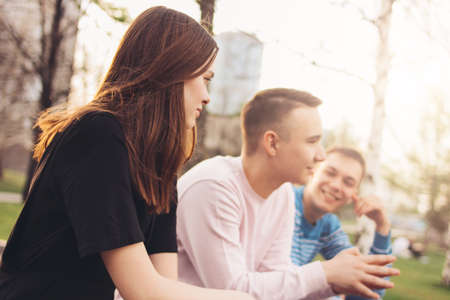 Group of friends Millennials students teenagers walking at city street, friendship, healthy...