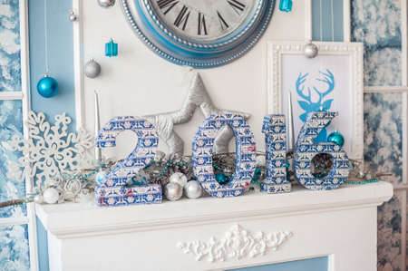 Christmas decor, fireplace and Christmas tree, new year conceptの写真素材
