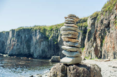 Concept of harmony and balance. Rock Zen on a background of a seaの写真素材