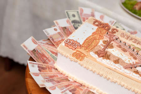 Cake in the form of Russian denominations of five thousand rubles, money concept