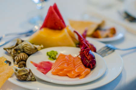 Catering service. Restaurant table with food. Huge amount of food on the table. Plates of food. Dinner time, lunch.の写真素材