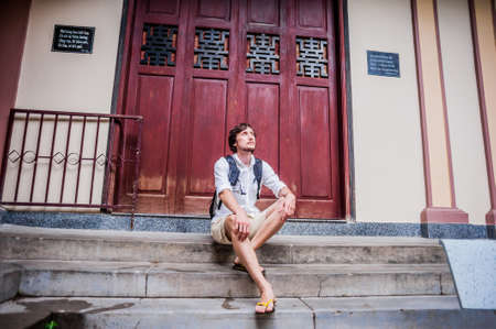 Happy tourist in Long Son Pagoda. Travel to Asia concept. Traveling with a baby concept.