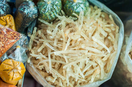 Dried coconut in a bag in the Vietnamese market. Asian food concept.の写真素材