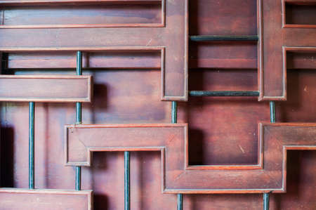 Texture of wooden wall in Buddhist temple Asian background conceptの写真素材