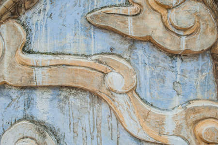 The texture of a wall in a Buddhist temple in Asia ceramic tile. The Colorful of ceramic background texture. Asian background conceptの写真素材