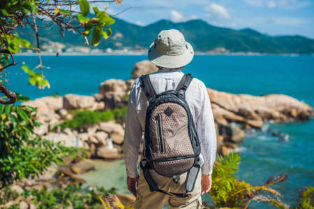 Man traveler look at Hon Chong cape, Garden stone, popular tourist destinations at Nha Trang. Vietnam. Asia Travel concept. Journey through Vietnam Concept.の写真素材