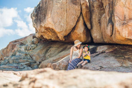 Mother and son travelers at the Hon Chong cape, Garden stone, popular tourist destinations at Nha Trang. Vietnam. Asia Travel concept. Journey through Vietnam Concept.の写真素材