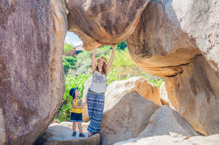 Mother and son travelers at the Hon Chong cape, Garden stone, popular tourist destinations at Nha Trang. Vietnam. Asia Travel concept. Journey through Vietnam Concept.の写真素材