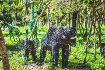 statue of an elephant made from recycled bottles medical. Waste recycling conceptの写真素材