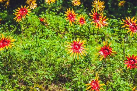 Recycled colorful plastic flower. Flowers made from a plastic bottle. plastic bottle recycled. Waste...