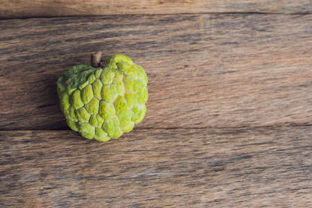 Cherimoya fruit on the table, ready to be eaten.の写真素材