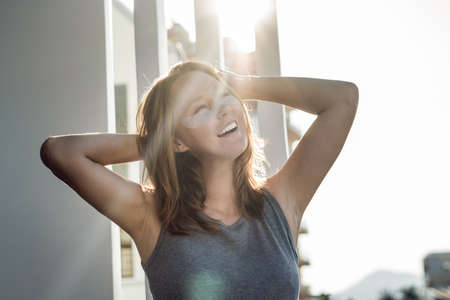 Portrait of Beauty Red-haired woman with eye patches showing an effect of perfect skin. Spa Girl.の写真素材