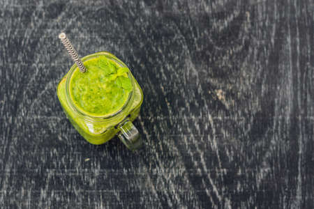 Green smoothies made of spinach. Healthy eating and sports concept.の写真素材