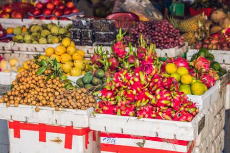 Variety of fruits on the Vietnamese market. Asian cuisine concept.の写真素材
